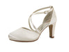 White high-heeled shoe with thin straps on a white background