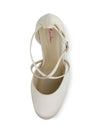 White shoe with thin strap on a white background